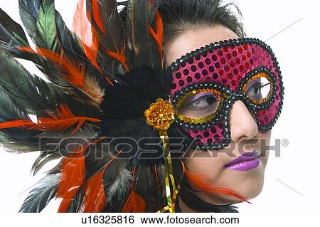 Stock Photograph - One Young Woman Only, Feather, Human Face, Young Adult, Creative People, Fashion, Creative. Fotosearch