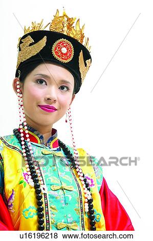 Stock Photo - Smiling, White Background, Waist-Up, Asian Ethnicity, One Person, Portrait. Fotosearch