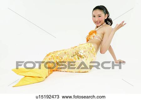 Stock Image - Young Adult, Gesturing, Cheerful, 18-19 Years. Fotosearch