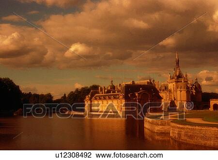 Stock Image - lake, reflection, sunset, cloud, canal, architecture, tourist attraction. Fotosearch