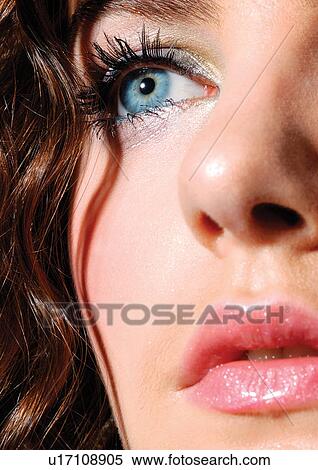 Half a beautiful female face View Large Photo Image Stock Photography - Half a beautiful female face. Fotosearch