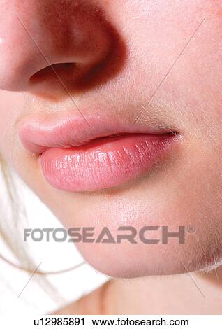 Stock Image - Human Mouth, Human Face, Human Lips, Young Woman, Human Nose. Fotosearch