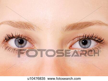 Stock Photography - One Person, Detail, Eyebrow, Female, Eyeball, Confidence, Extreme Close-Up. Fotosearch