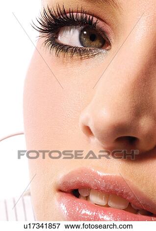 Stock Photo - Up-close to a beautiful woman's face. Fotosearch