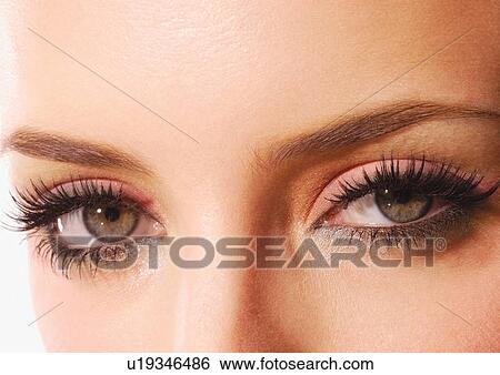 Stock Photograph - Up-close to a woman's eyes. Fotosearch