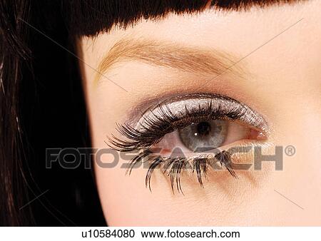 Up close to an eye with fake eyelashes View Large Photo Image Stock Image - Up close to an eye with fake eyelashes . Fotosearch