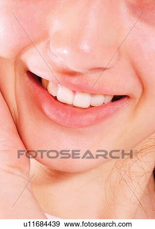 Stock Photo - Young Adult, Young Woman, One Young Woman Only, One Person, Human Face, Detail. Fotosearch