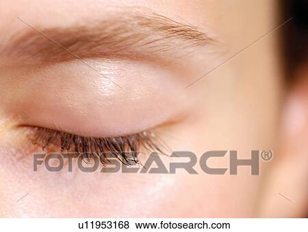 Stock Photo - Young Adult, Young Woman, One Young Woman Only, One Person, Human Face, Detail. Fotosearch