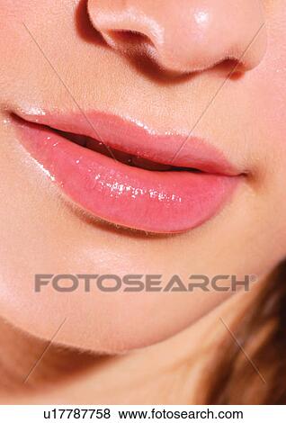 Stock Photo - Young Adult, Young Woman, One Young Woman Only, One Person, Human Face, Detail. Fotosearch