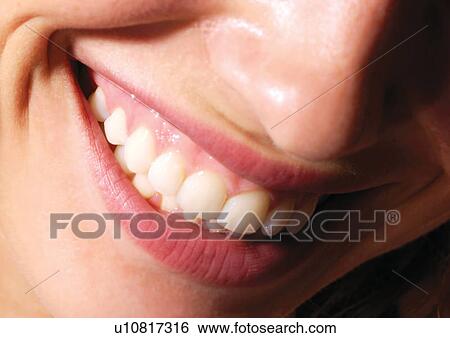 Stock Photograph - Young Adult, Young Woman, One Young Woman Only, One Person, Human Face, Detail. Fotosearch
