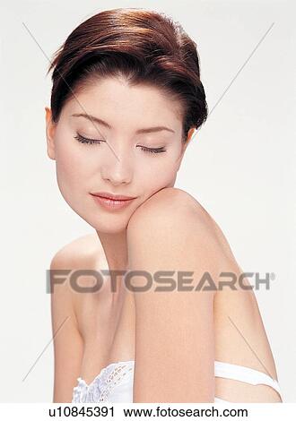 Brown Hair, Casual Clothing, Close-Up View Large Photo Image Stock Image - Brown Hair, Casual Clothing, Close-Up. Fotosearch