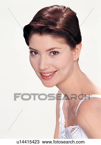Stock Image - One Young Woman Only, White Background, Close-Up, Toothy Smile. Fotosearch