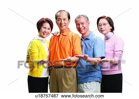 Stock Photo - Asian Ethnicity, Cardigan, Brown Hair, Balding, Adults Only. Fotosearch