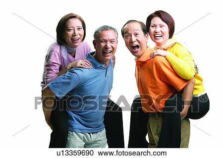 Stock Image - Asian Ethnicity, Carrying, Brown Hair, Balding, Adults Only. Fotosearch