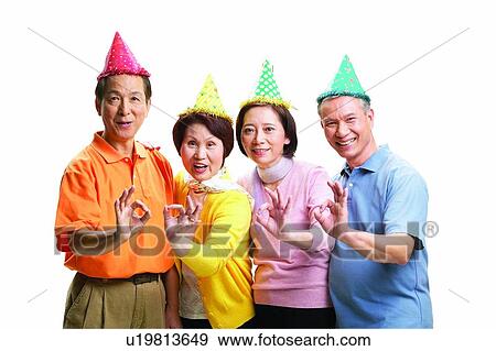 Stock Photo - Cardigan, Togetherness, Indoor, Asian Ethnicity, Mature Women. Fotosearch