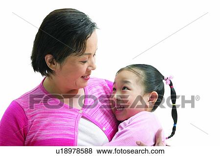 Stock Photo - Casual Clothing, Family And Love, Cardigan, Two People, Affectionate, Granddaughter. Fotosearch