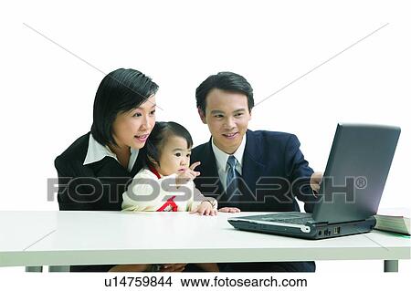 Picture - Girls, Wireless Technology, Formal Clothing, White Background, Looking Down. Fotosearch