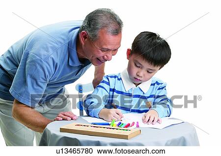 Stock Image - Grandparent, Table, Elementary Age, Togetherness, Child, Boys, Asian Ethnicity. Fotosearch