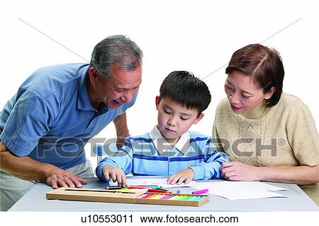 Stock Image - Looking Down, Head And Shoulders, Mature Adult, Waist-Up, Elementary Age, Gray Hair, Child. Fotosearch