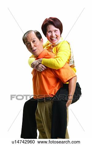 Stock Image - Polo Shirt, Portrait, Short Hair, Heterosexual Couple, Happiness. Fotosearch