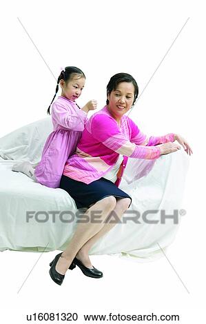 Stock Image - Sandal, Pigtails, 6-7 Years, Grandmother, Short Hair, Childhood, Black Hair. Fotosearch