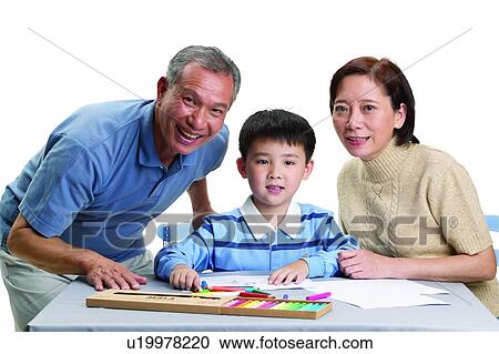 Top, Table, Elementary Age, Brown Hair, Toothy Smile, Heterosexual Couple, Family & Love View Large Photo Image Stock Image - Top, Table, Elementary Age, Brown Hair, Toothy Smile, Heterosexual Couple, Family & Love. Fotosearch