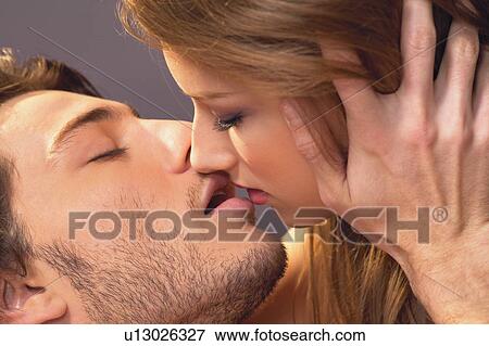 Stock Photo - Close-Up, Girl, Semi-Dress, Confidence, Indoor, Female. Fotosearch