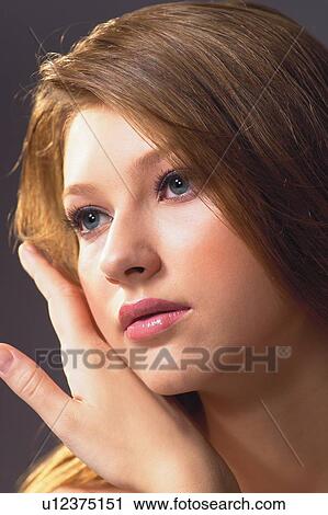 Indoor, Human Face, One Young Woman Only, Serene People, Brown Hair View Large Photo Image Stock Image - Indoor, Human Face, One Young Woman Only, Serene People, Brown Hair. Fotosearch