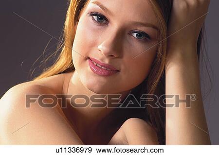 Stock Photo - Smiling, Flirty Couples I, Semi-Dress, Female, Solitude. Fotosearch