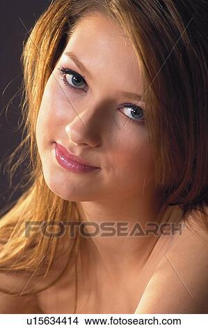 Picture - Smiling, Posing, Individuality, Solitude. Fotosearch