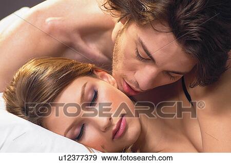 Stock Photo - Young Couple, Semi-Dress, Togetherness, Flirty Couples I. Fotosearch