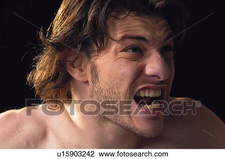 Stock Image - Black Background, Brown Hair, Close-Up. Fotosearch