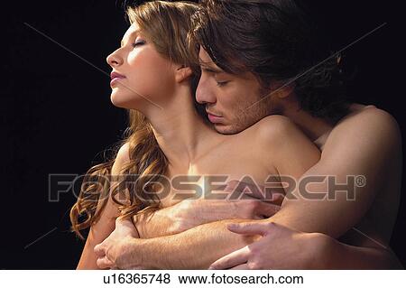 Black Background, Young Women, Brown Hair, Sitting, Togetherness View Large Photo Image Stock Photo - Black Background, Young Women, Brown Hair, Sitting, Togetherness. Fotosearch