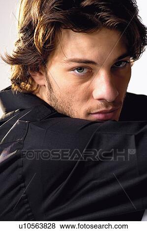 Stock Photo - Brown Hair, Casual Clothing, Close-Up. Fotosearch