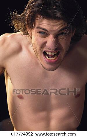 Stock Image - Head And Shoulders, Indoor, Brown Hair. Fotosearch