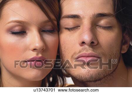 Heterosexual Couple, Brown Hair, Eyes Closed, Romance, Flirty Couples II, Cheek To Cheek, Young Couple View Large Photo Image Stock Image - Heterosexual Couple, Brown Hair, Eyes Closed, Romance, Flirty Couples II, Cheek To Cheek, Young Couple. Fotosearch
