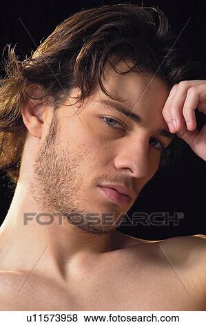Stock Photo - Lifestyles, One Young Man Only, Desire, Content. Fotosearch