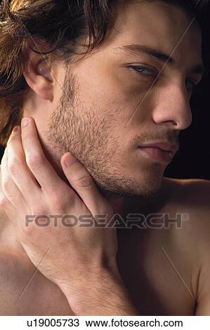 Stock Image - One Young Man Only, Male, Individuality, Contemplation, Content. Fotosearch