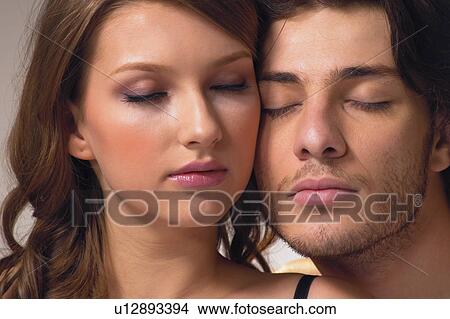 Sensuality, Indoor, Young Adult, Young Men, Eyes Closed, Togetherness View Large Photo Image Picture - Sensuality, Indoor, Young Adult, Young Men, Eyes Closed, Togetherness. Fotosearch