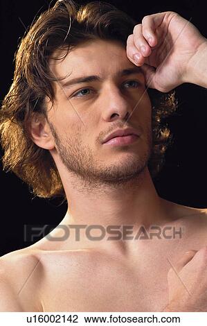 Stock Image - Thinking, Black Background, Lifestyles. Fotosearch