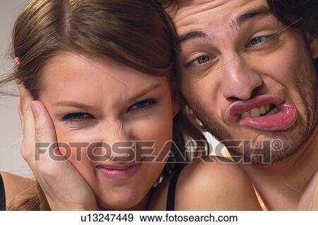 Stock Photo - Young Couple, Young Men, Portrait, Head And Shoulders. Fotosearch