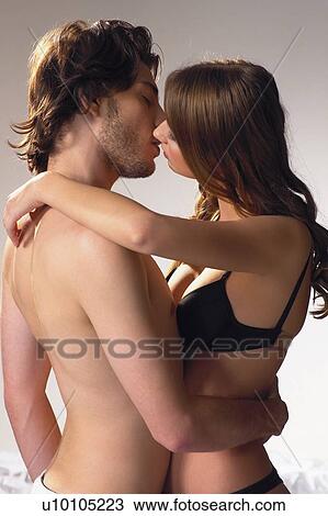 Stock Image - Arm Around, Brown Hair, Beard, Adults Only. Fotosearch