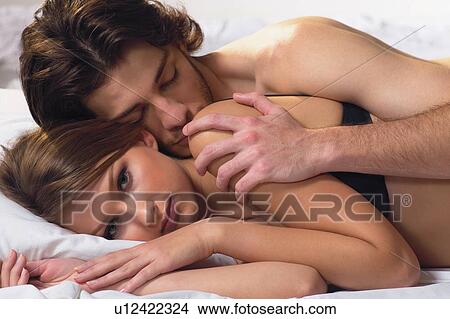 Lover, Man & Woman, Sensuality, Close-Up, Care, Bed View Large Photo Image Picture - Lover, Man & Woman, Sensuality, Close-Up, Care, Bed. Fotosearch