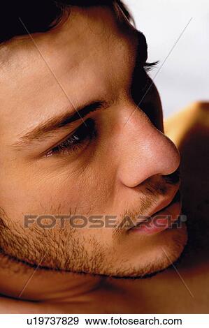 Stock Photo - One Person, Serene People, Content, Shadow, Young Adult. Fotosearch