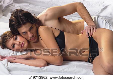 Pajamas, Lover, Bonding, Looking At Camera, Affectionate View Large Photo Image Stock Image - Pajamas, Lover, Bonding, Looking At Camera, Affectionate. Fotosearch