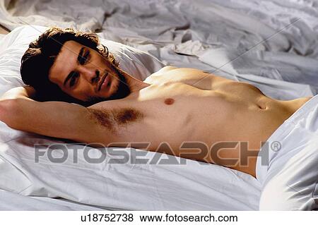 Stock Photo - Serene People, Young Adult, Bedroom, Individuality. Fotosearch