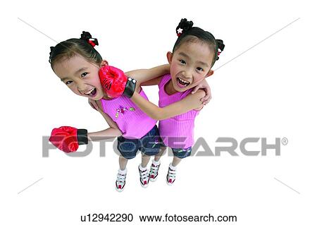 Stock Image - Brown Hair, Boxing Glove, Portrait, Children Only, Contact Sports. Fotosearch