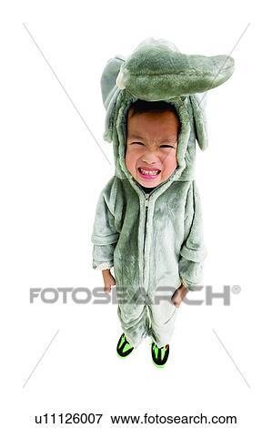 Stock Photo - Clenching Teeth, Portrait, One Boy Only, Standing, Halloween. Fotosearch