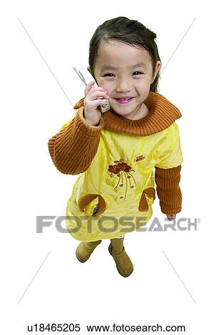 Stock Photography - On The Phone, Wireless Technology, Brown Hair, Smiling, One Child Only, Focus Children. Fotosearch