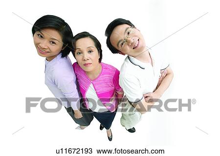 Stock Image - Arms Crossed, Black Hair, Asian Ethnicity, Adults Only. Fotosearch